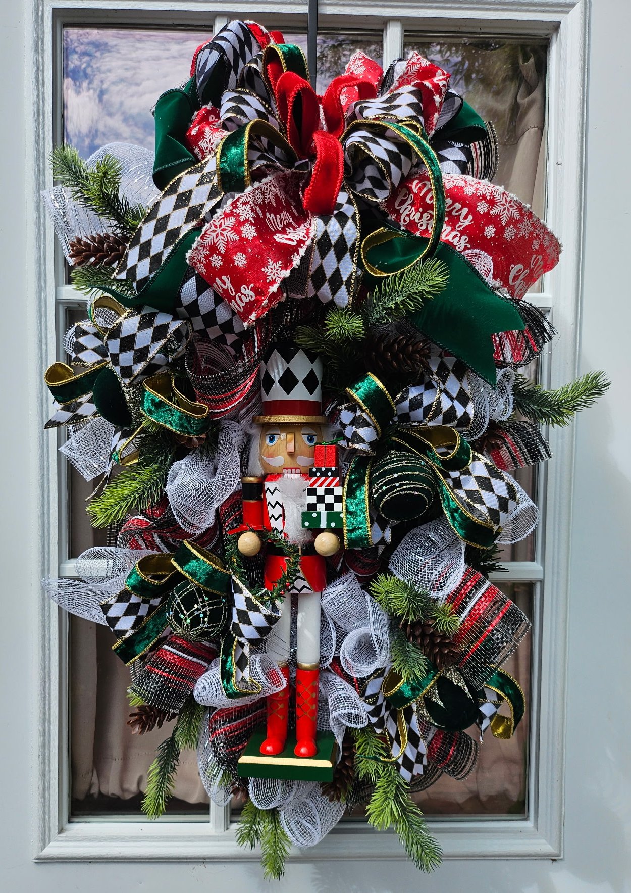 Christmas Nutcracker Swag with Evergreen Branches and Pinecones